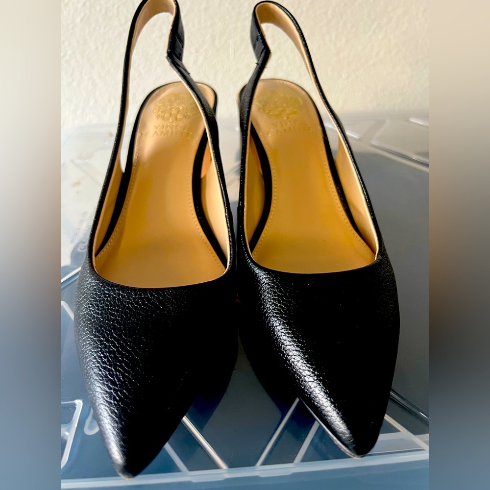 Vice Camuto heel with gold trim on the top of the heel.
